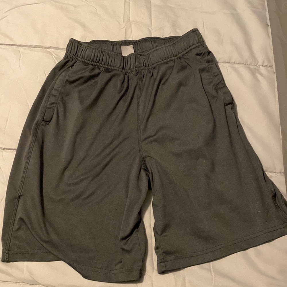 Old Navy active shorts. Fit just above knee on 5’7” male.